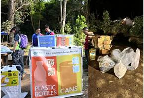 A group of people standing near a sign

AI-generated content may be incorrect.